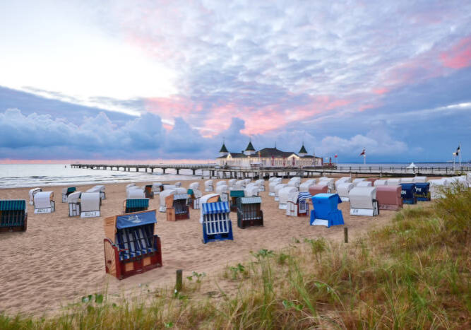 Ahlbeck Seebruecke morning time at baltic sea beach and sight Ahlbeck pier in sunrise.